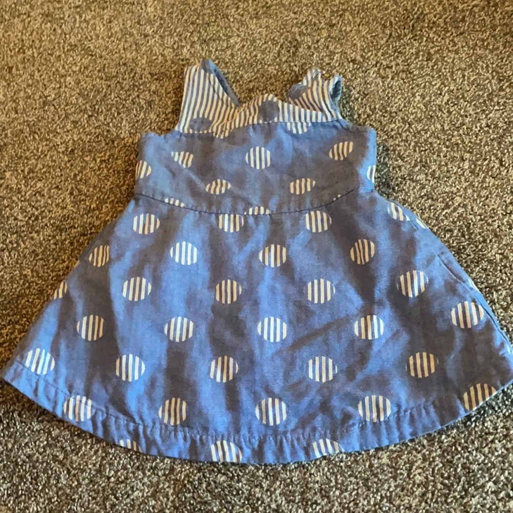 Adorable dress with peekaboo back.